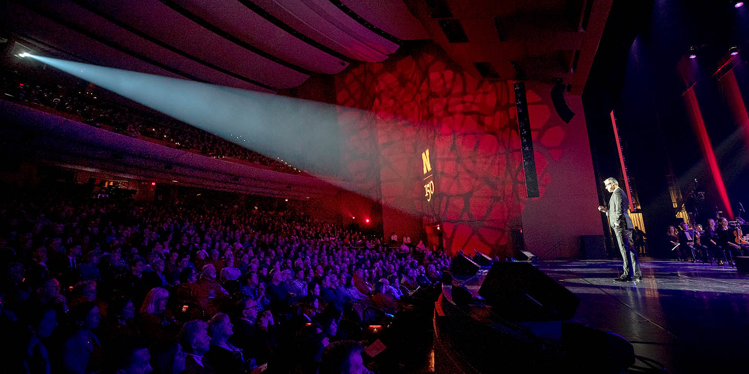 Lied Center event with a spotlight on stage. 