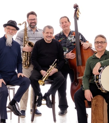 five men in suits pose together with their jazz ensemble instruments