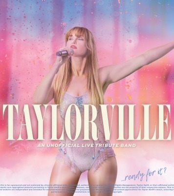 blonde girl singing into a microphone in front of pink, blue and purple background
