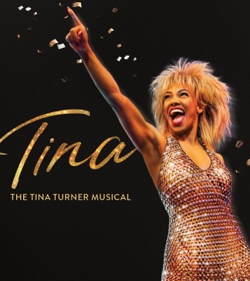 Woman pointing up with black background and the text "Tina: Tina Turner Musical"