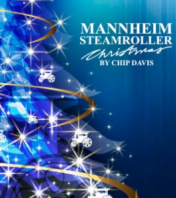 Image with Mannheim Steamroller CHRISTMAS BY CHIP DAVIS on the right with a blue Christmas tree with lights on the left.