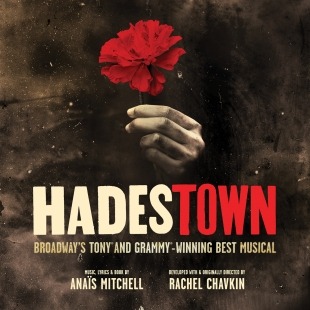 A hand holding a red rose with the text "Hadestown"