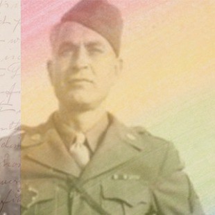 Image of man with military suit and hat on.
