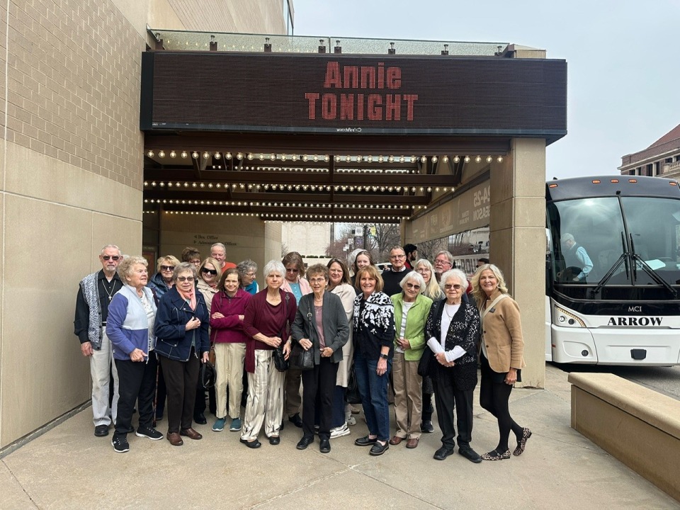 Moostash Joe Tours to Annie a group attends a performance at the lied center