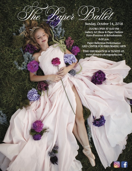 Photo of a ballerina in a white dress holding flowers.