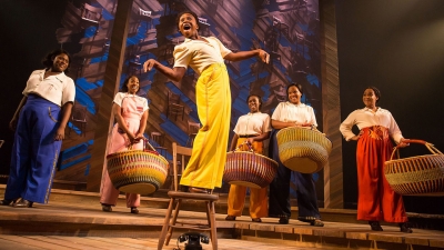 Image of the six women on stage in the Color Purple holding baskets