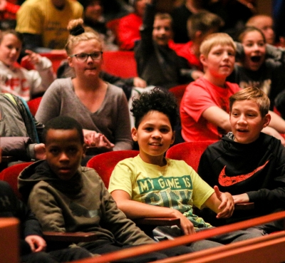 Image of children seated in the audience at a Lied Center performance