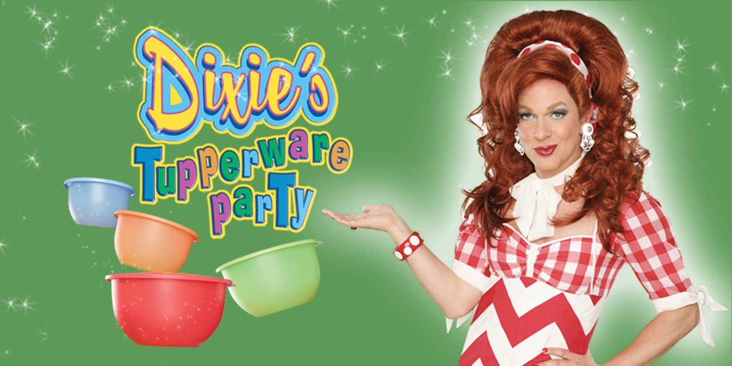 Person in auburn hair wearing a red chevron dress in front of a green background