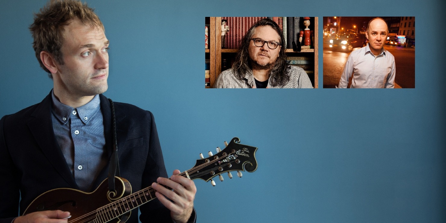 Chris Thile holding a mandolin