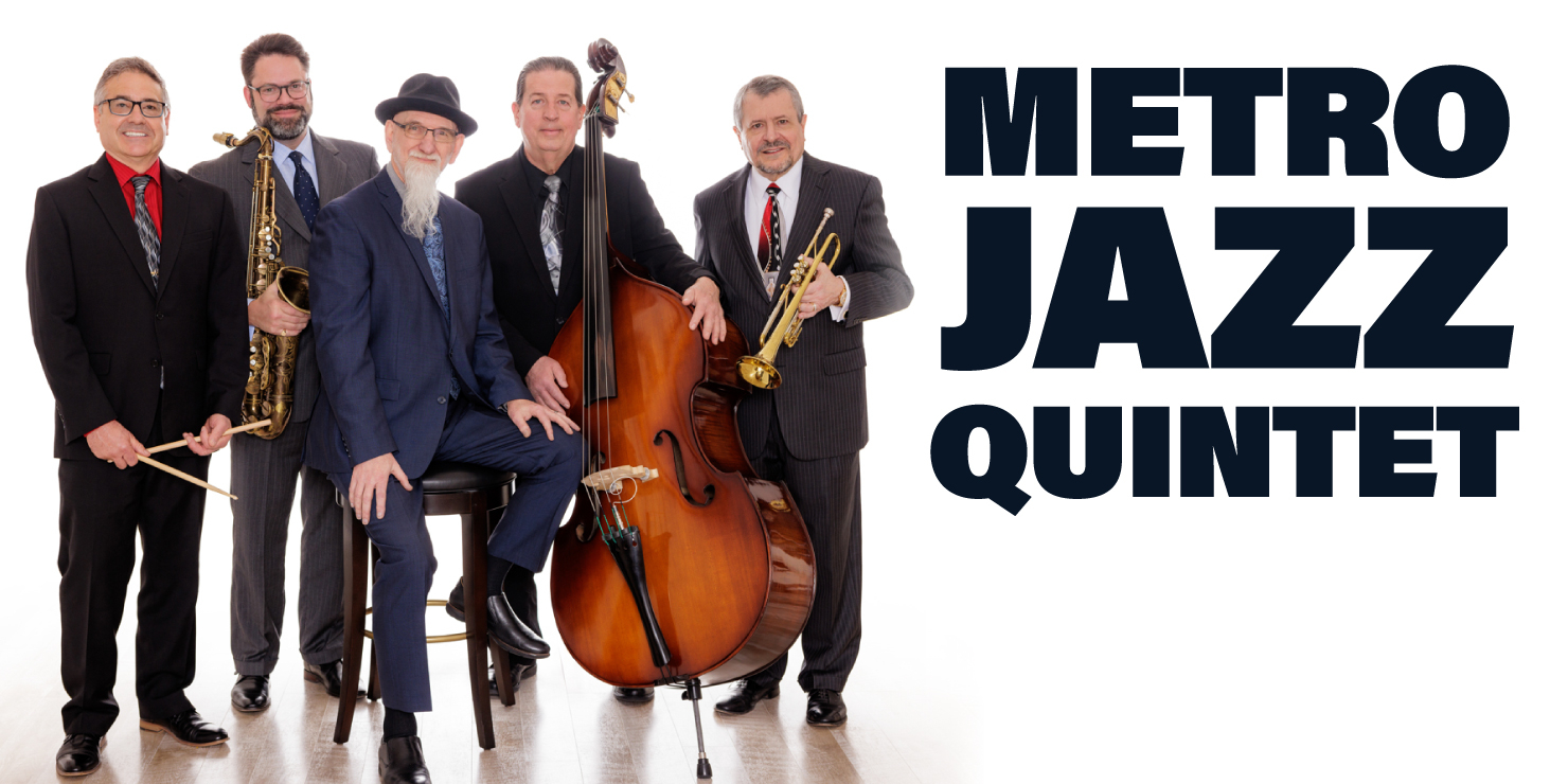 Five men holding jazz instruments looking at the camera in front of a white background