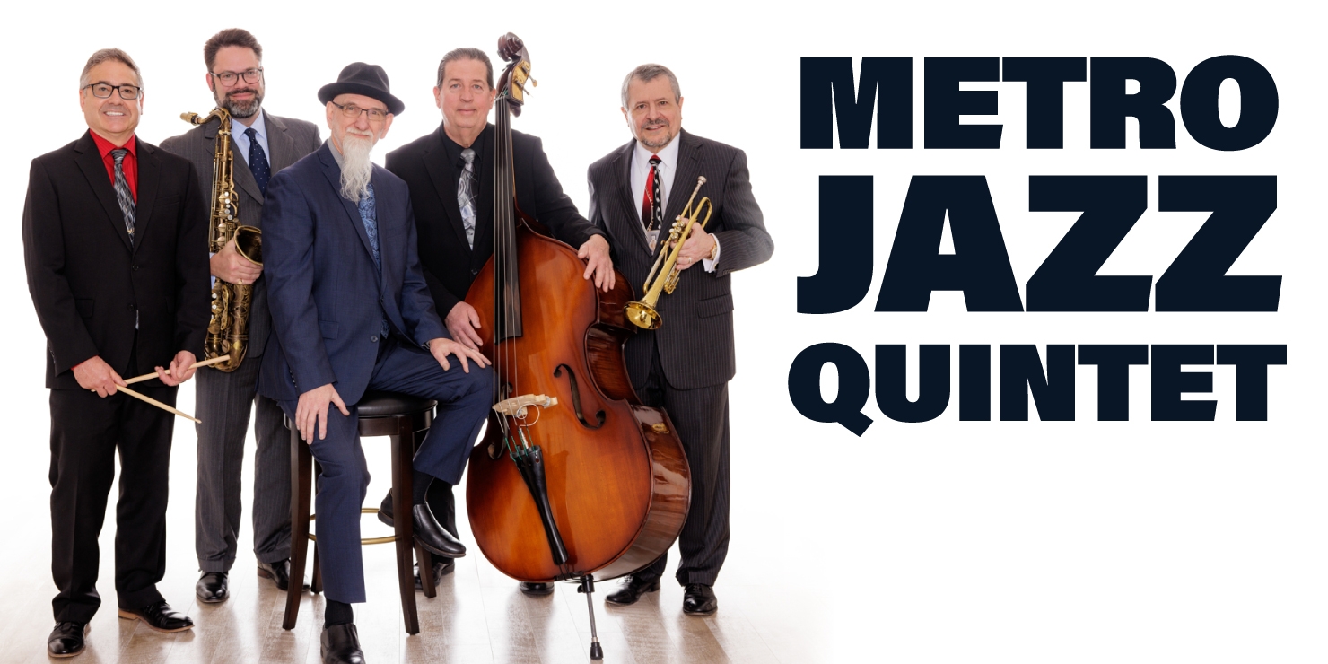 Five men holding jazz instruments looking at the camera in front of a white background