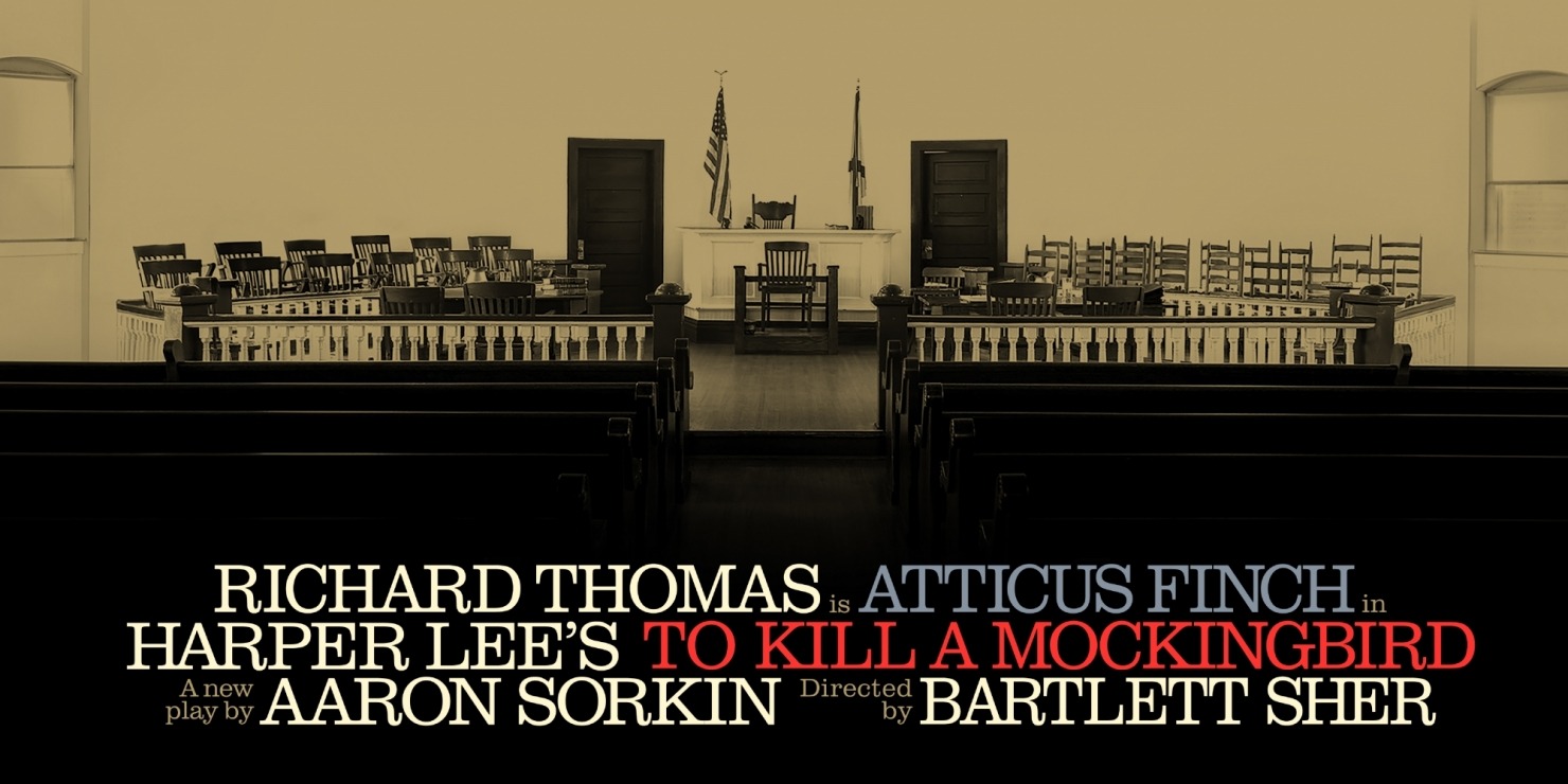 Photo of an empty court room. Shows the judges seat with the American flag on a pole behind the seat.