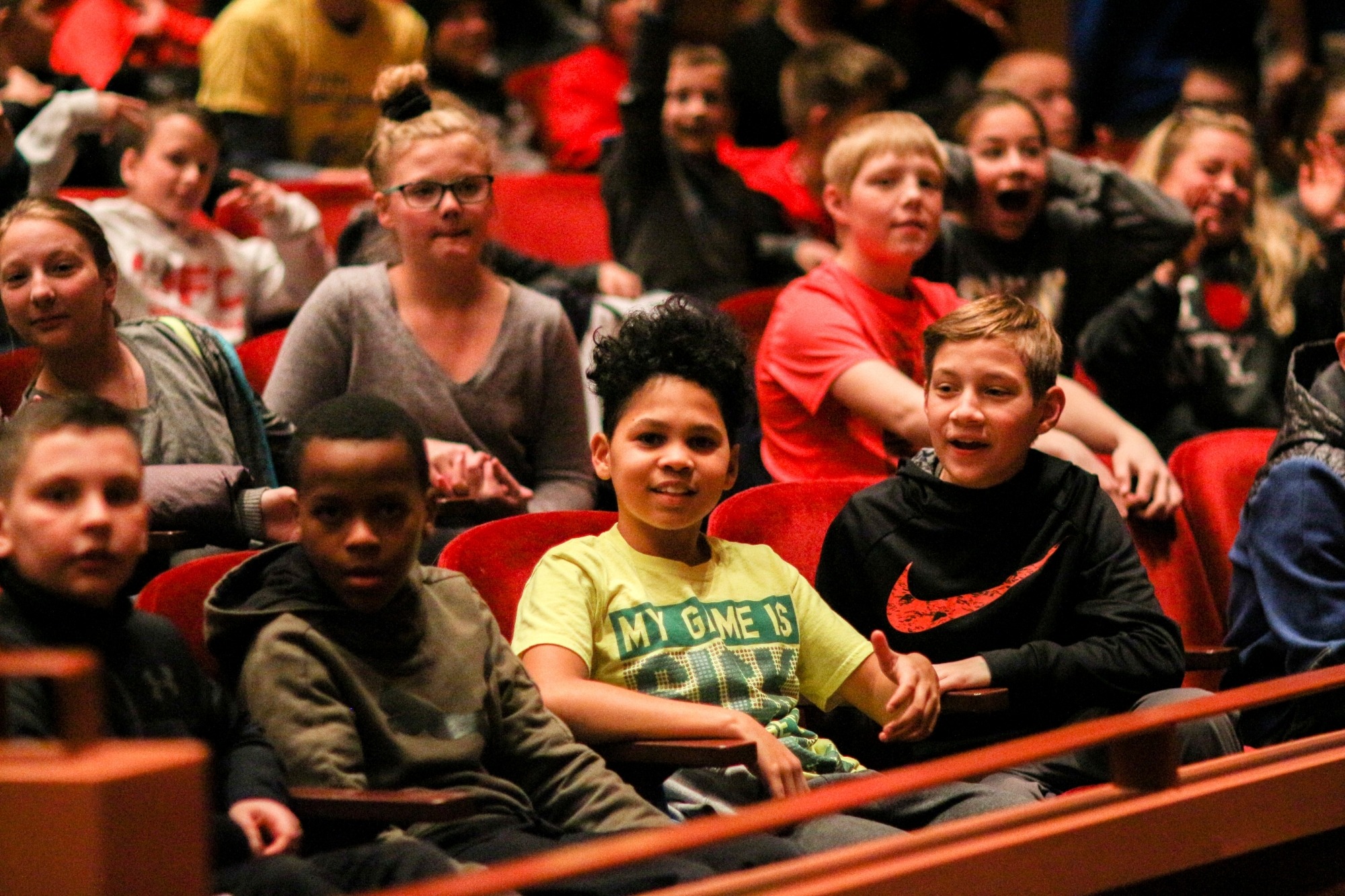 Image of young students sitting in the audience at the Lied Center