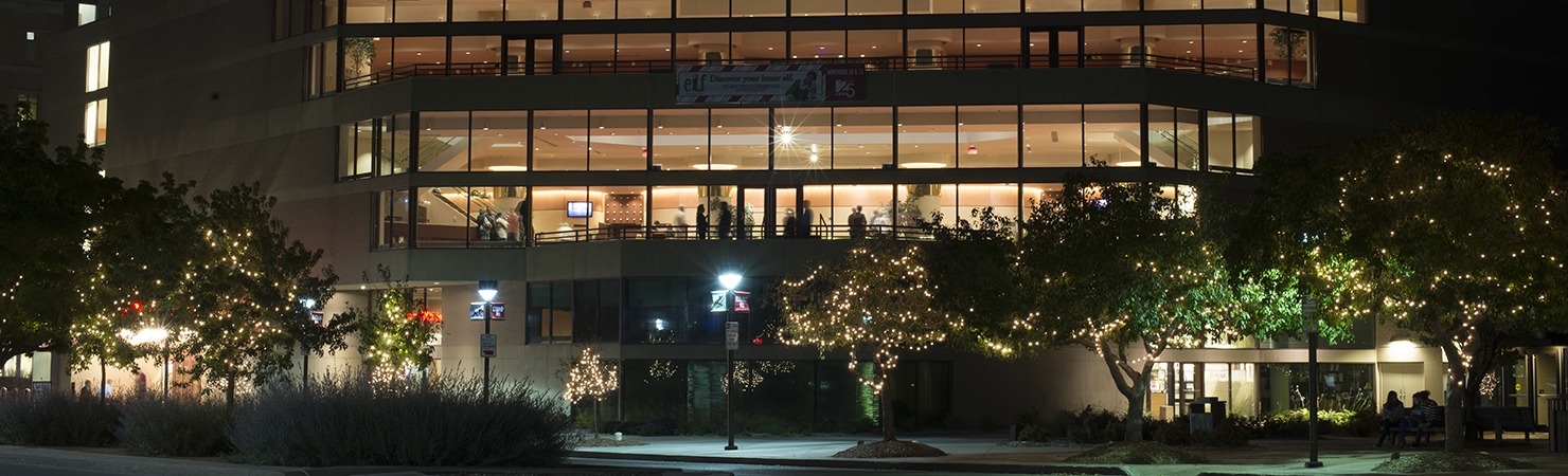 The outside of the Lied Center at night