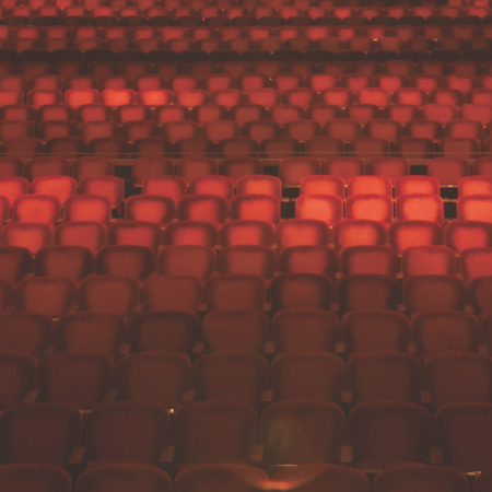Image of empty red theater seats